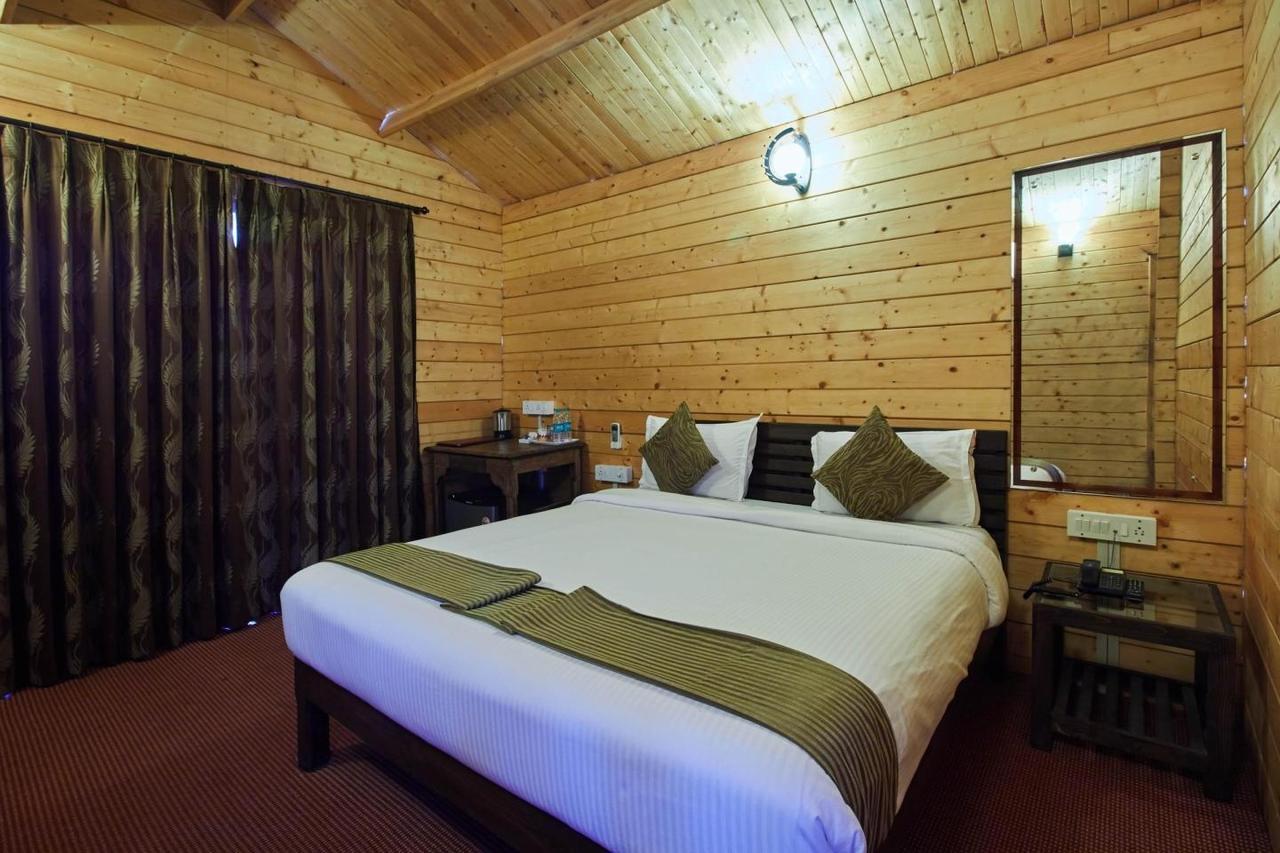 Tiara Fiesta Beach Cottages Morjim Exteriör bild
