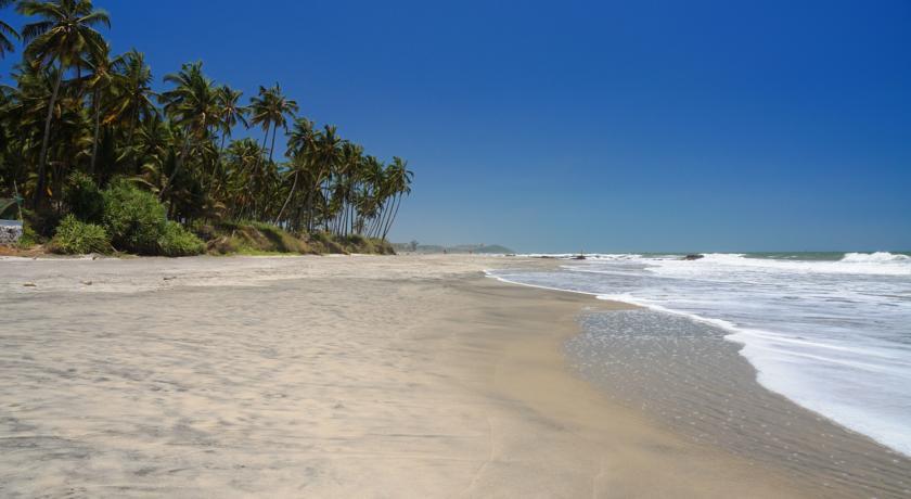 Tiara Fiesta Beach Cottages Morjim Exteriör bild