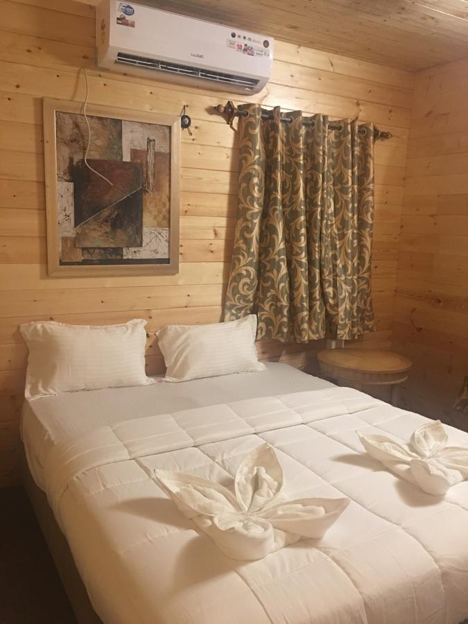 Tiara Fiesta Beach Cottages Morjim Exteriör bild
