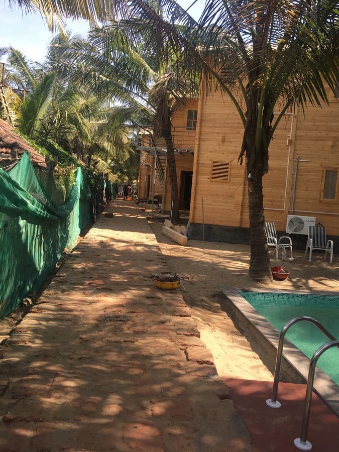 Tiara Fiesta Beach Cottages Morjim Exteriör bild