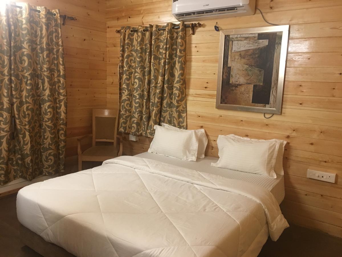 Tiara Fiesta Beach Cottages Morjim Exteriör bild